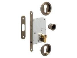 Kit cerradura puerta corredera ø60 cuero superacodado cilindro 20-20 latonado.